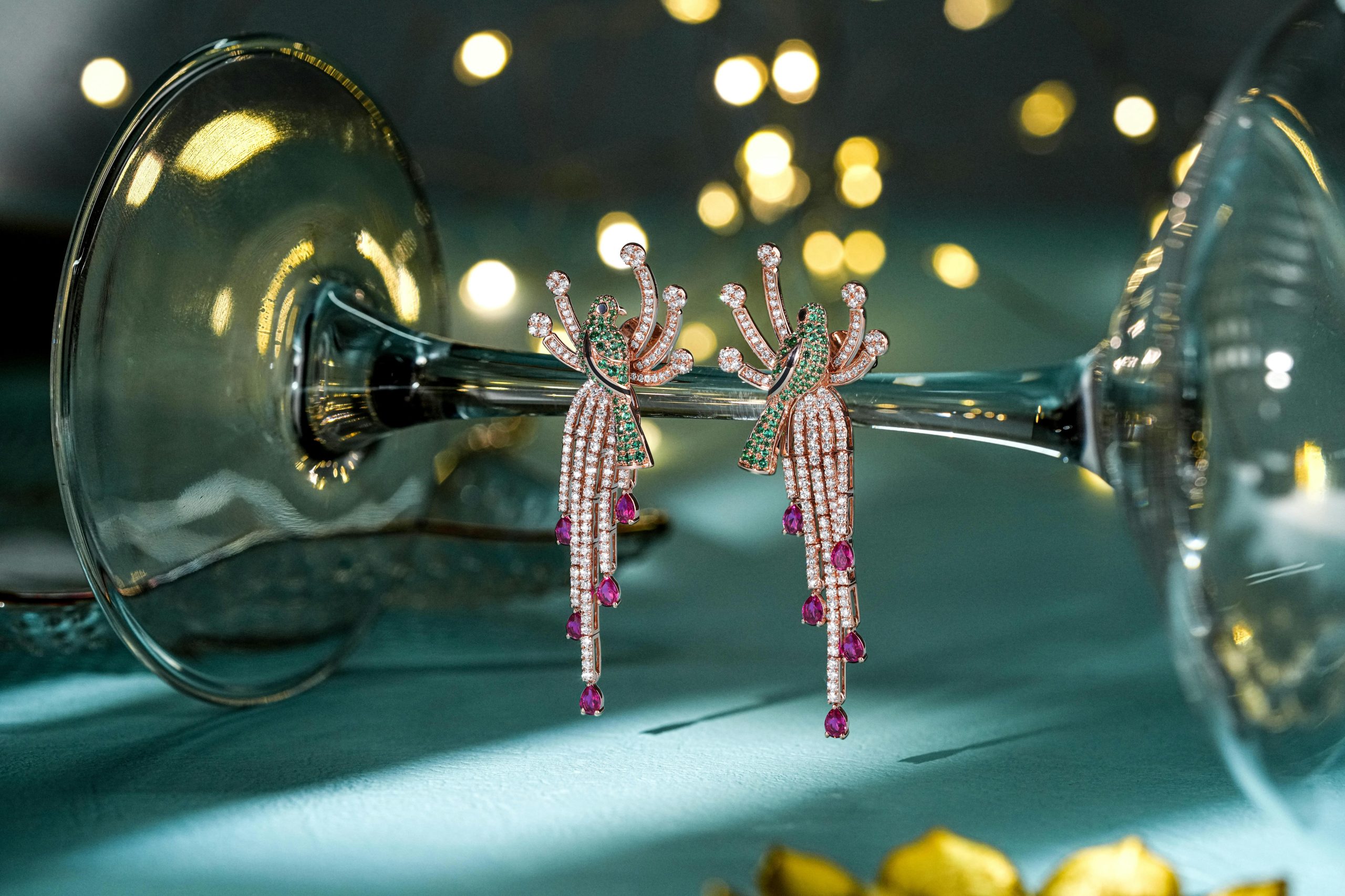 Delicate diamond earrings set against a festive backdrop for sparkling elegance.